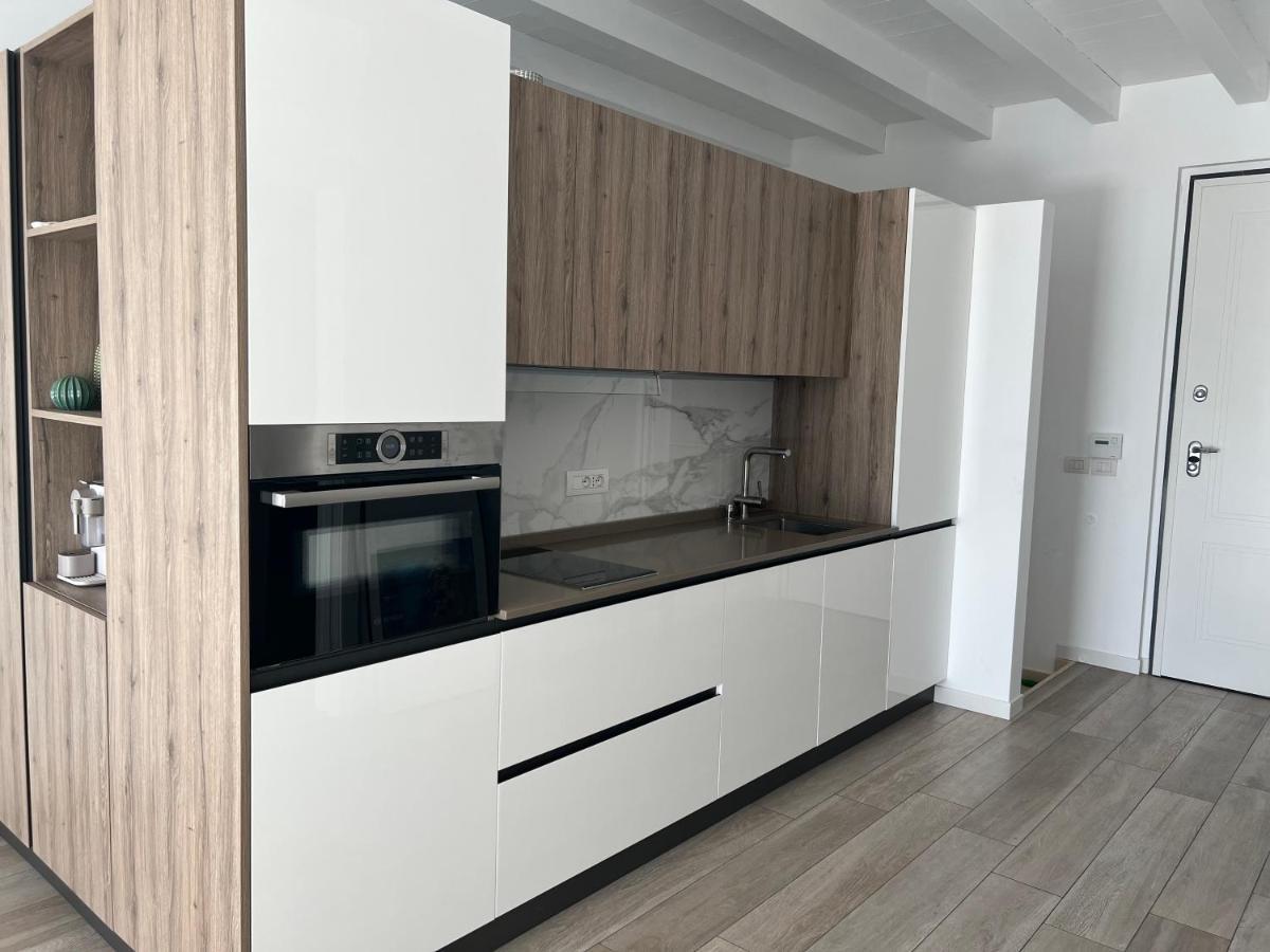 Paganini Suites And Apartments 西尔米奥奈 外观 照片