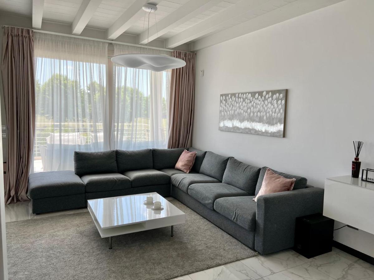 Paganini Suites And Apartments 西尔米奥奈 外观 照片