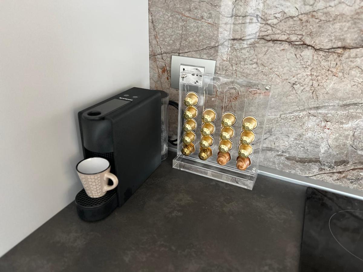 Paganini Suites And Apartments 西尔米奥奈 外观 照片